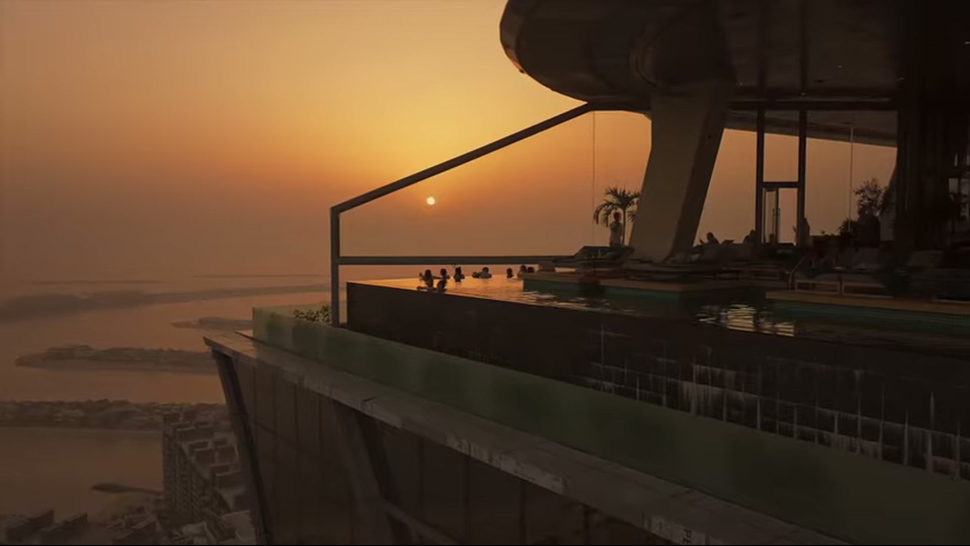 Sunset view from Aura Skypool infinity terrace with swimmers and hazy Dubai coastline below